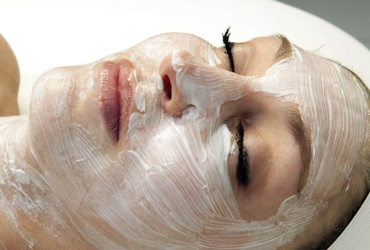 Woman Getting A Facial Treatment At A Spa