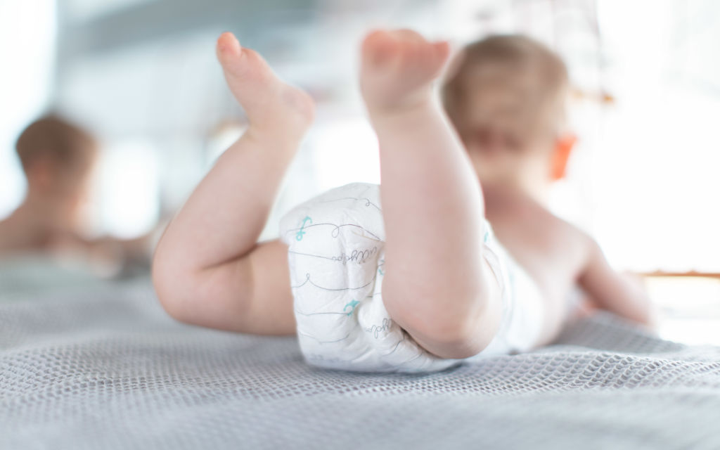 Infant With Motoric Toy