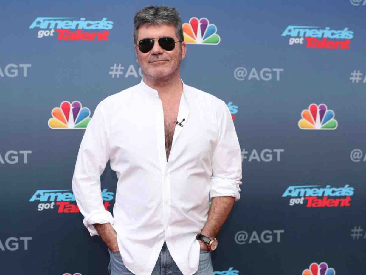 Simon Cowell – 5 Feet 8 Inches