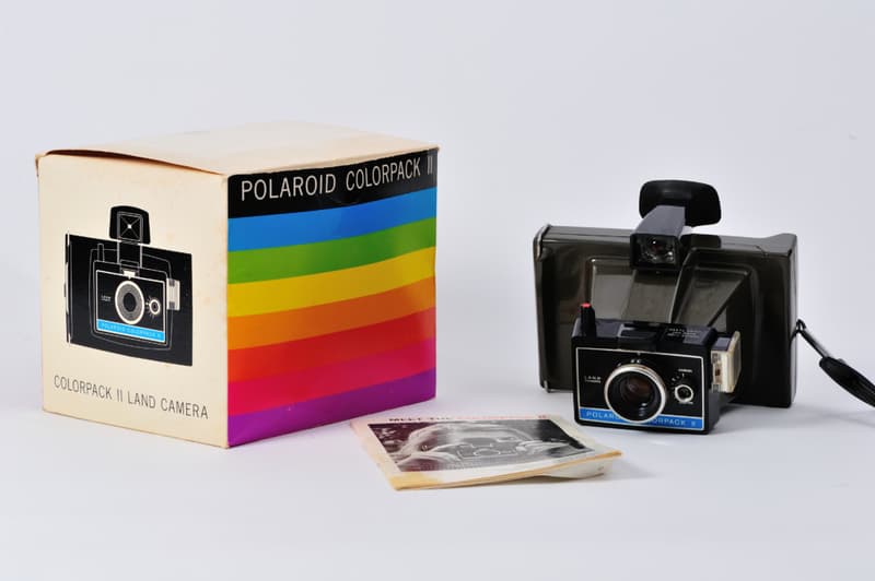 Shaking Polaroid Photos Vigorously