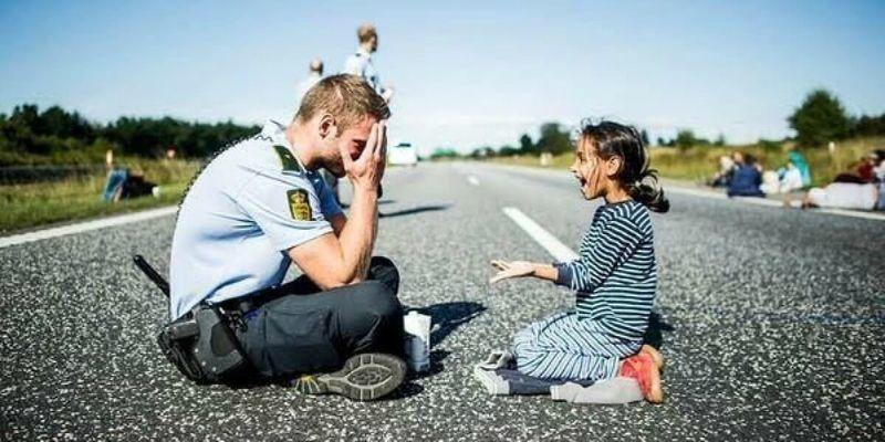 She Looked Up To The Police Officer
